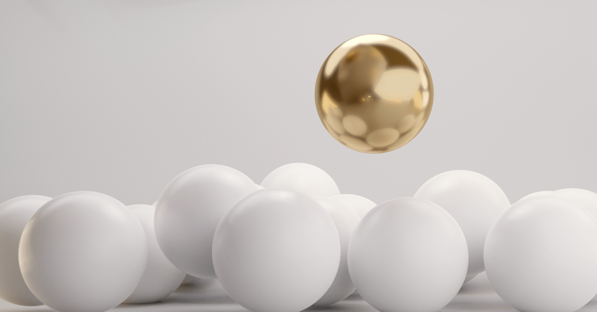 White balls and gold ball 