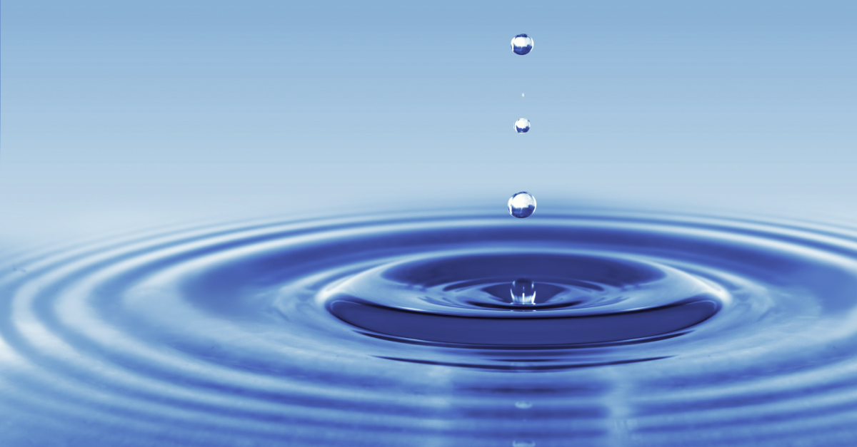 Water drops landing in water