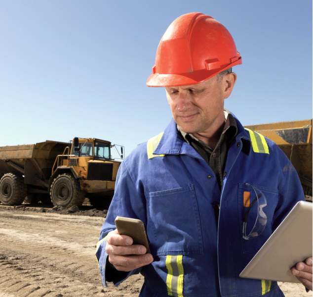 Man-looking-at-devices