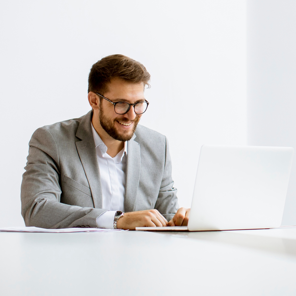 Man sitting in front of laptop