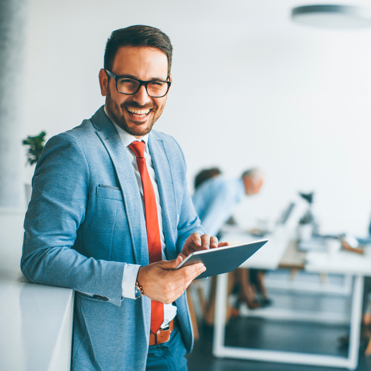 Young-businessman-looking-happy-after-getting-TARGIT-software